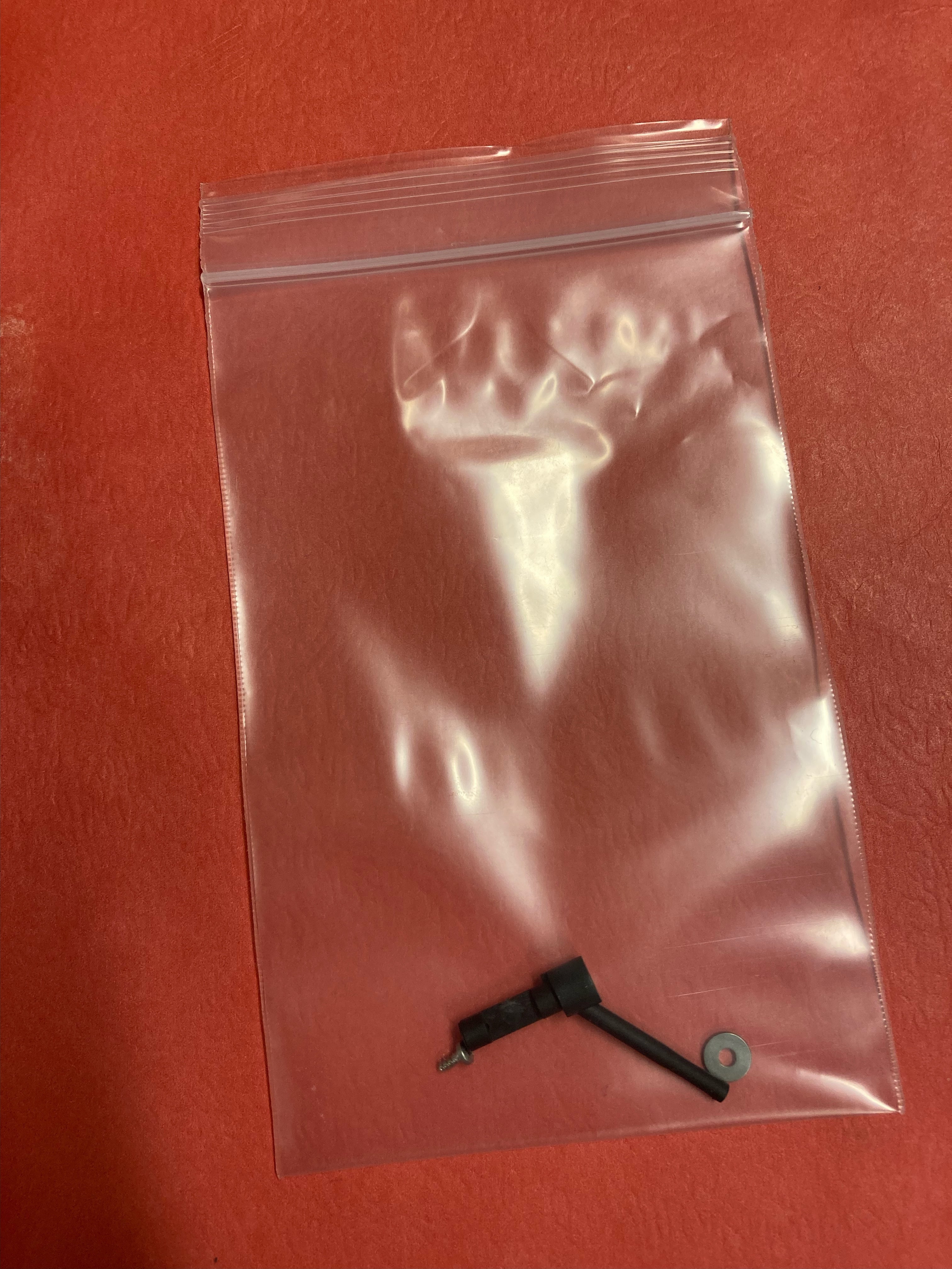 Cue lever kit in bag for vertical turntable and vertical Bluetooth turntable.